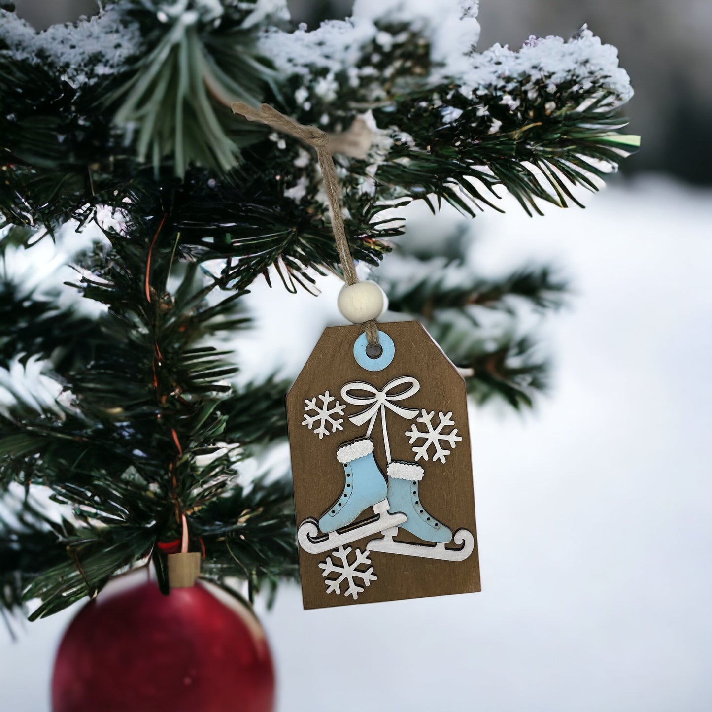 Christmas ornament featuring ice skates with money or gift card holder, handcrafted from wood.