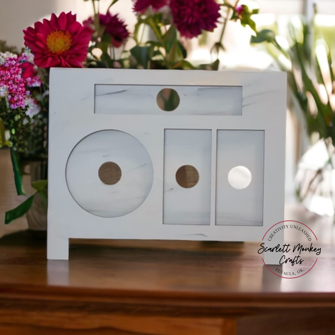Interchangeable seasonal standing calendar sign base on table with flower background.