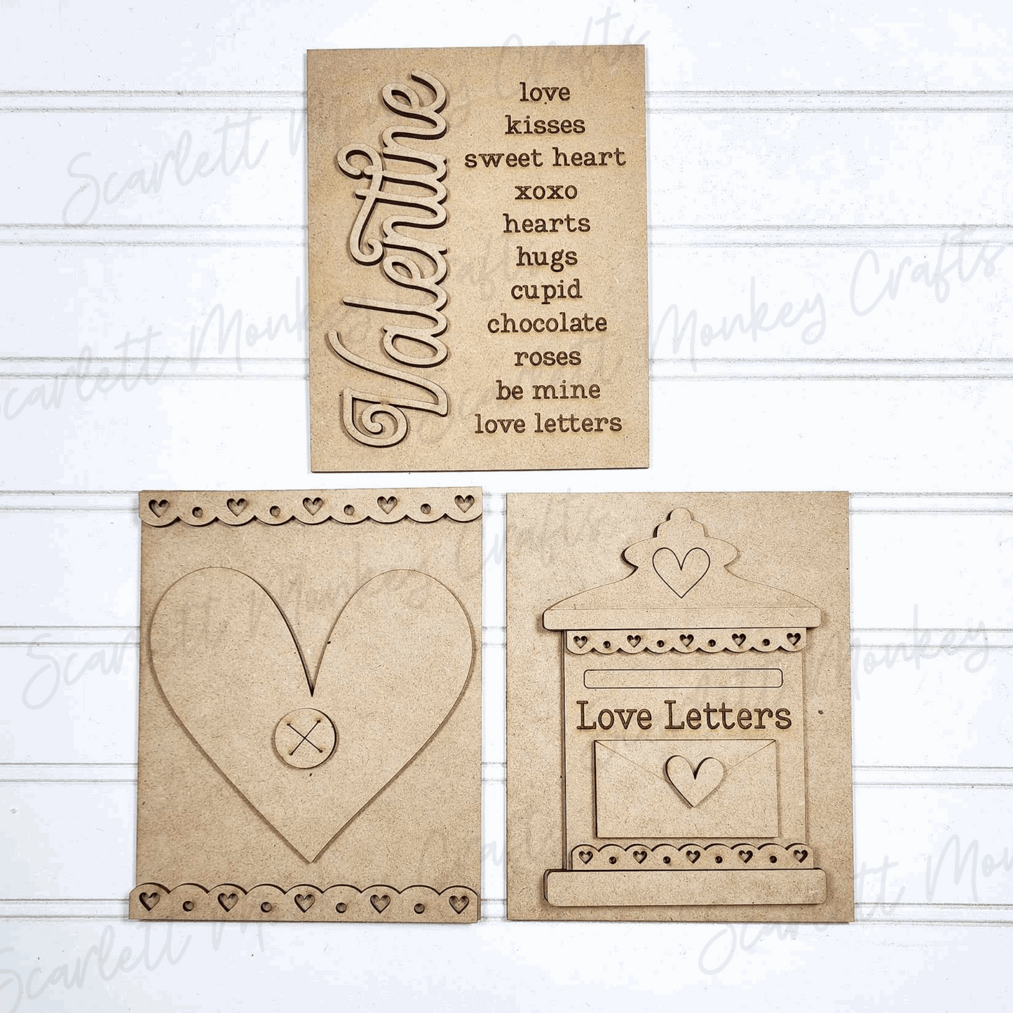 Valentine's Day paintable wood project trio signs with heart and love letter designs.