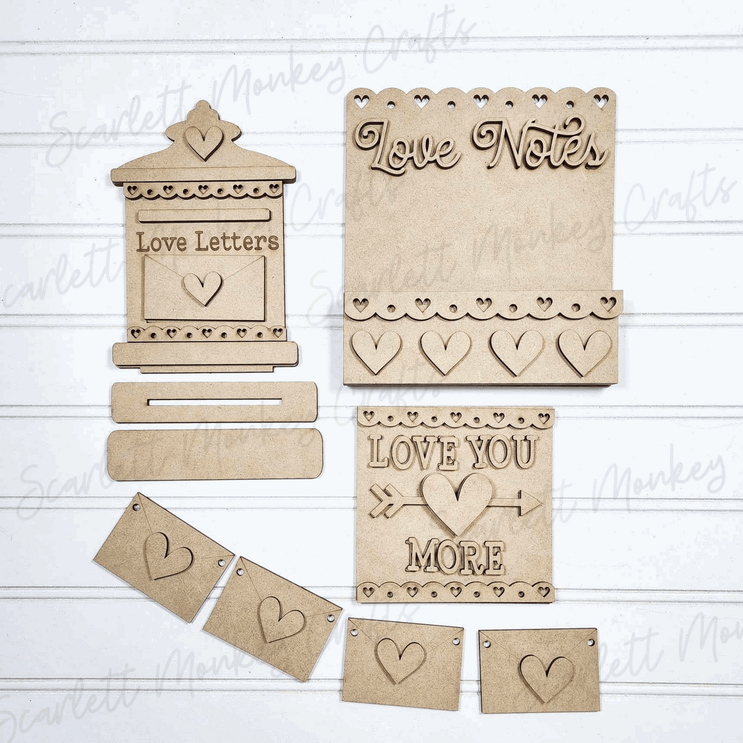 Valentine's Day tiered tray set, paintable wood project with heart and love-themed designs.