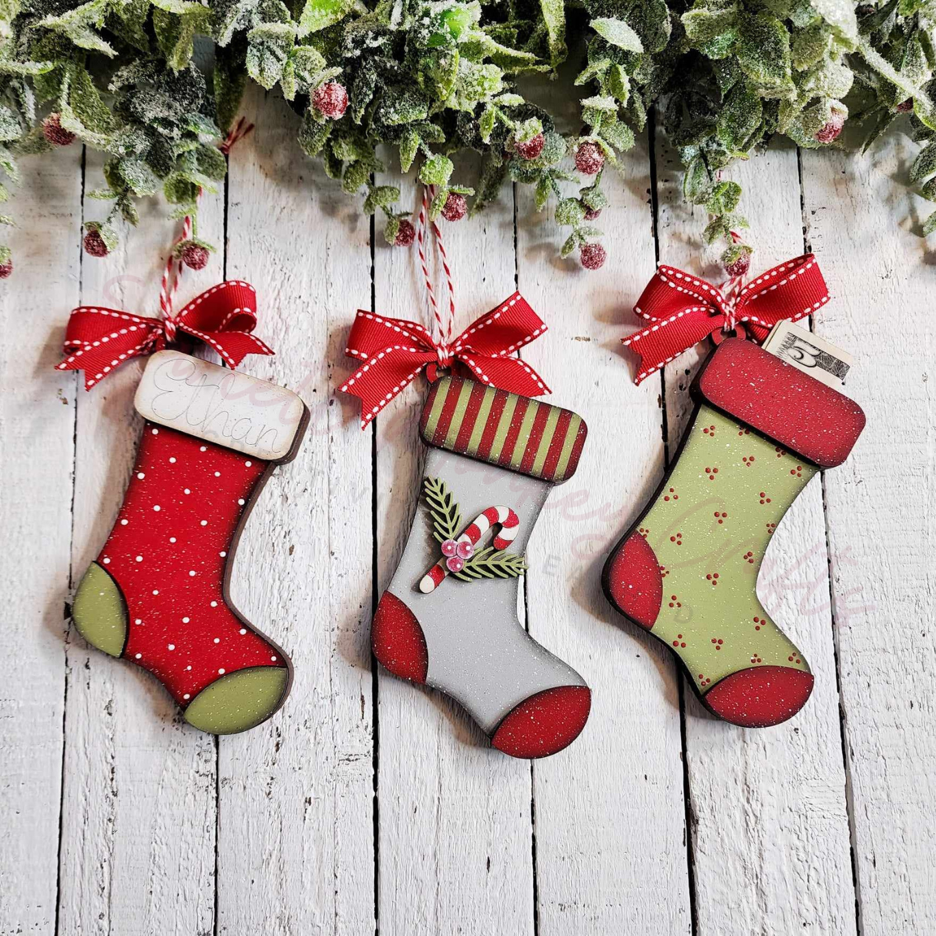 Paintable wood stocking ornaments with money holder for craft projects.