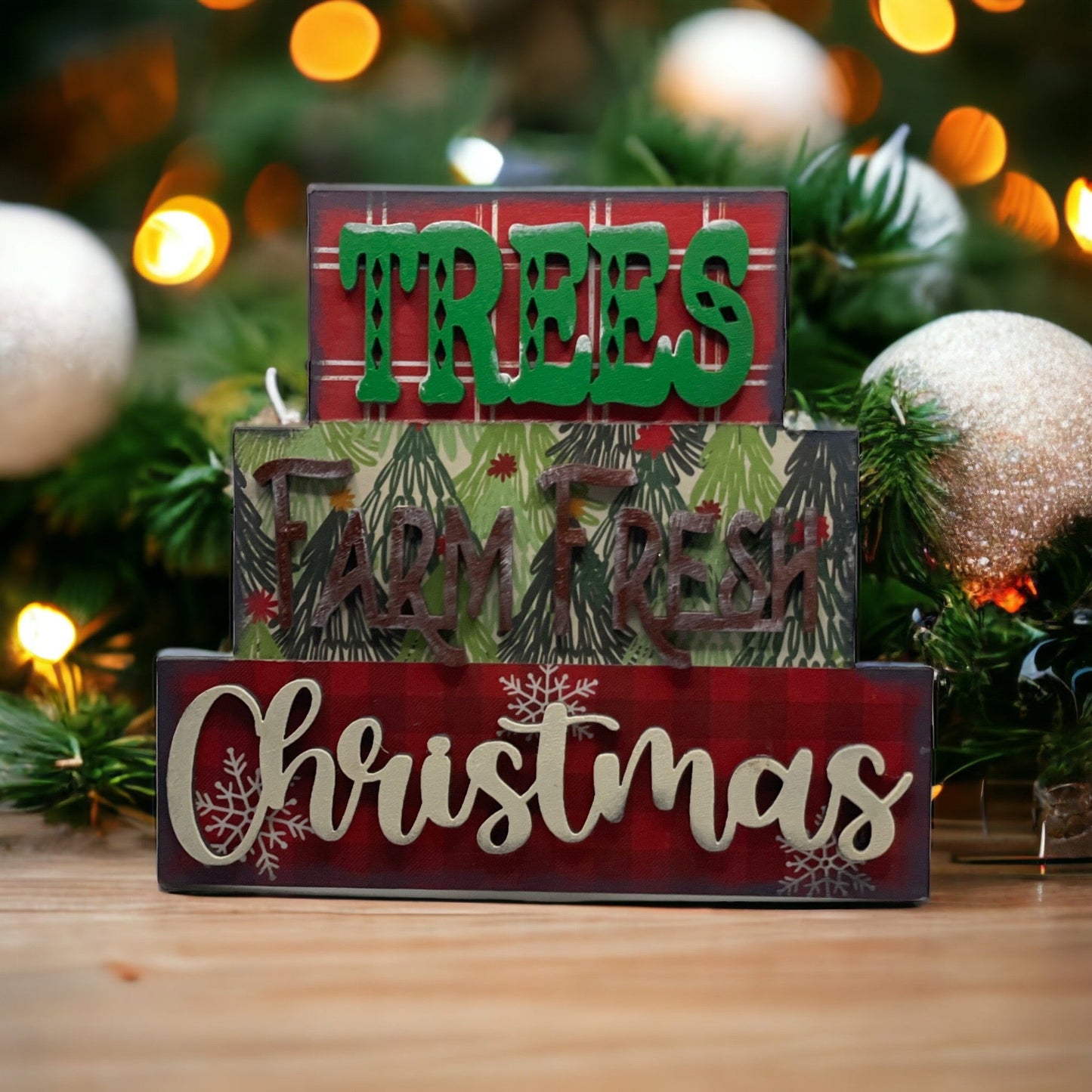 Handcrafted Christmas Word Stacker with festive design on display.