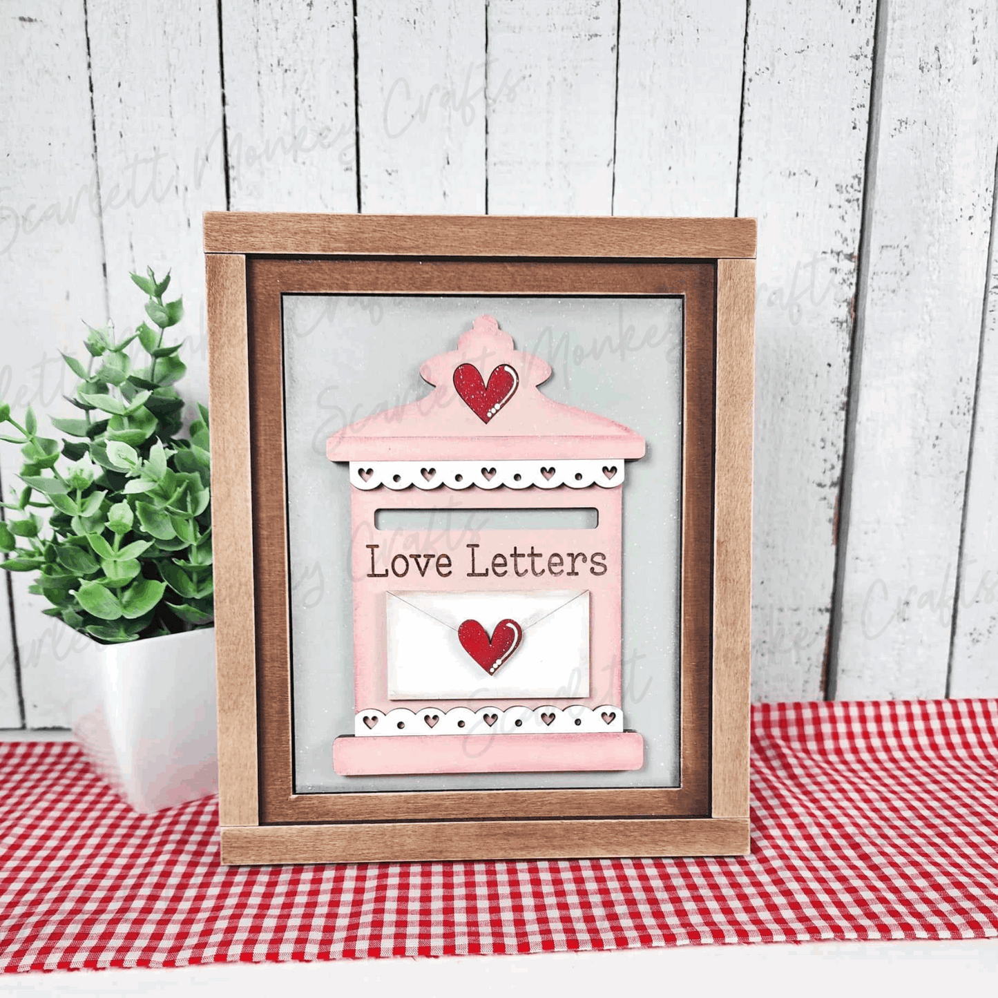 Valentine's Day trio wood signs with love letters design in pink frame.