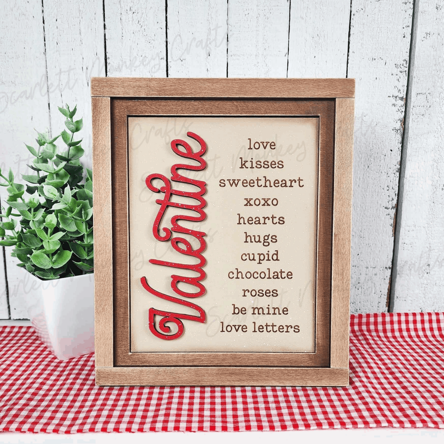 Paintable Valentine's Day wood sign project displaying romantic words in a rustic frame.