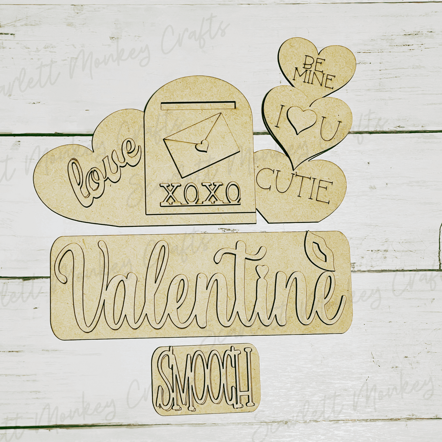 Paintable wood project Valentine interchangeable wooden cutouts for crafting and personalization.