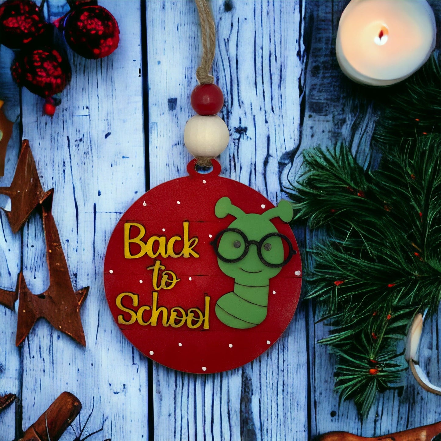 Handcrafted Christmas ornament with "Back to School" design, vibrant colors, and quality wood.