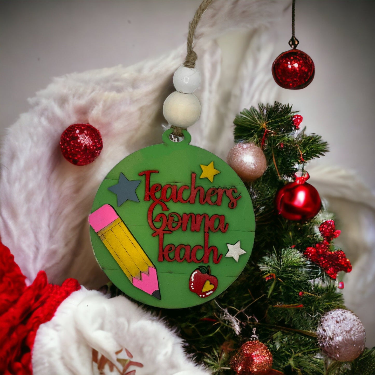 Christmas ornament with "Teachers Gonna Teach" design, handcrafted from quality wood.
