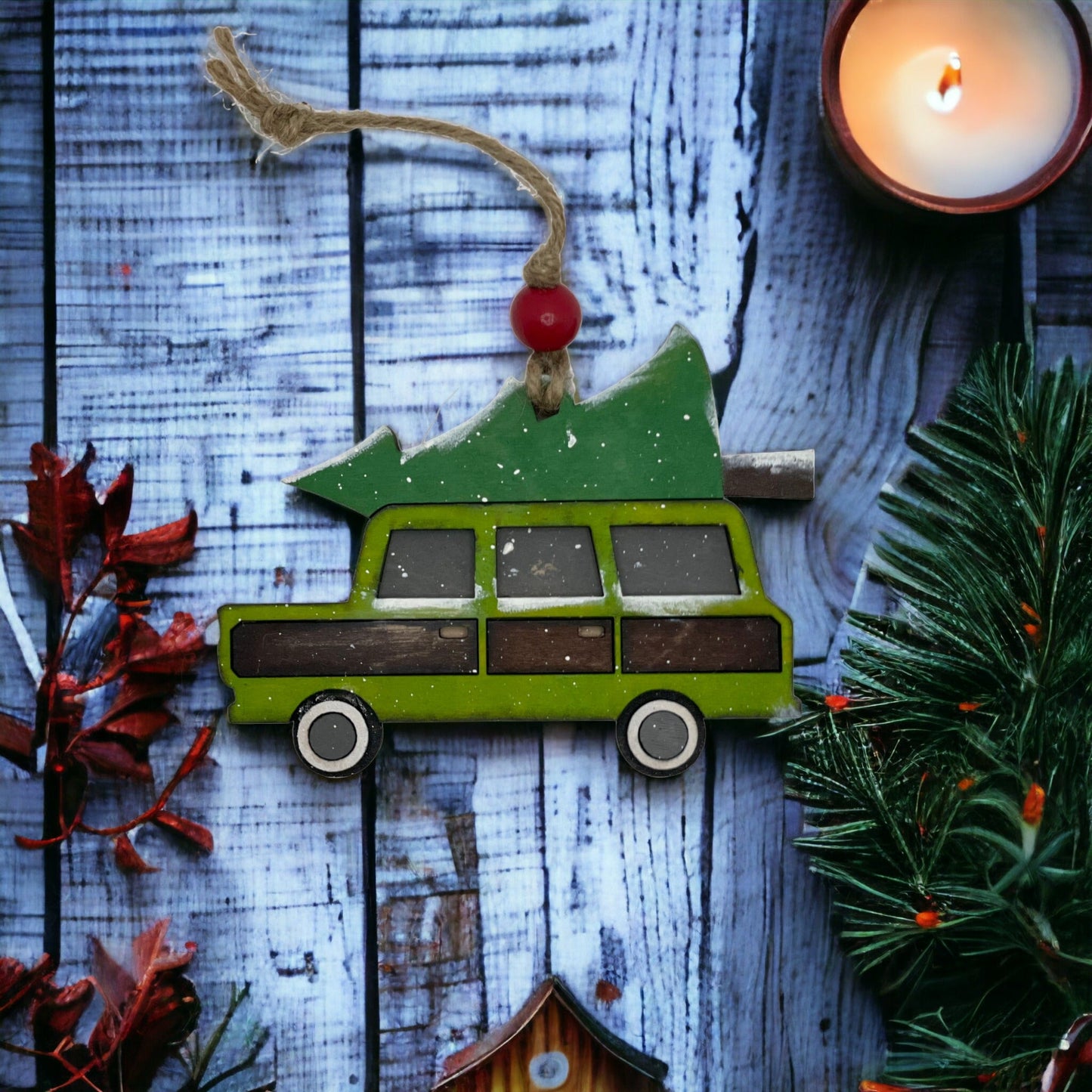 Handcrafted Family Christmas Truck Ornament with vibrant colors and festive design.