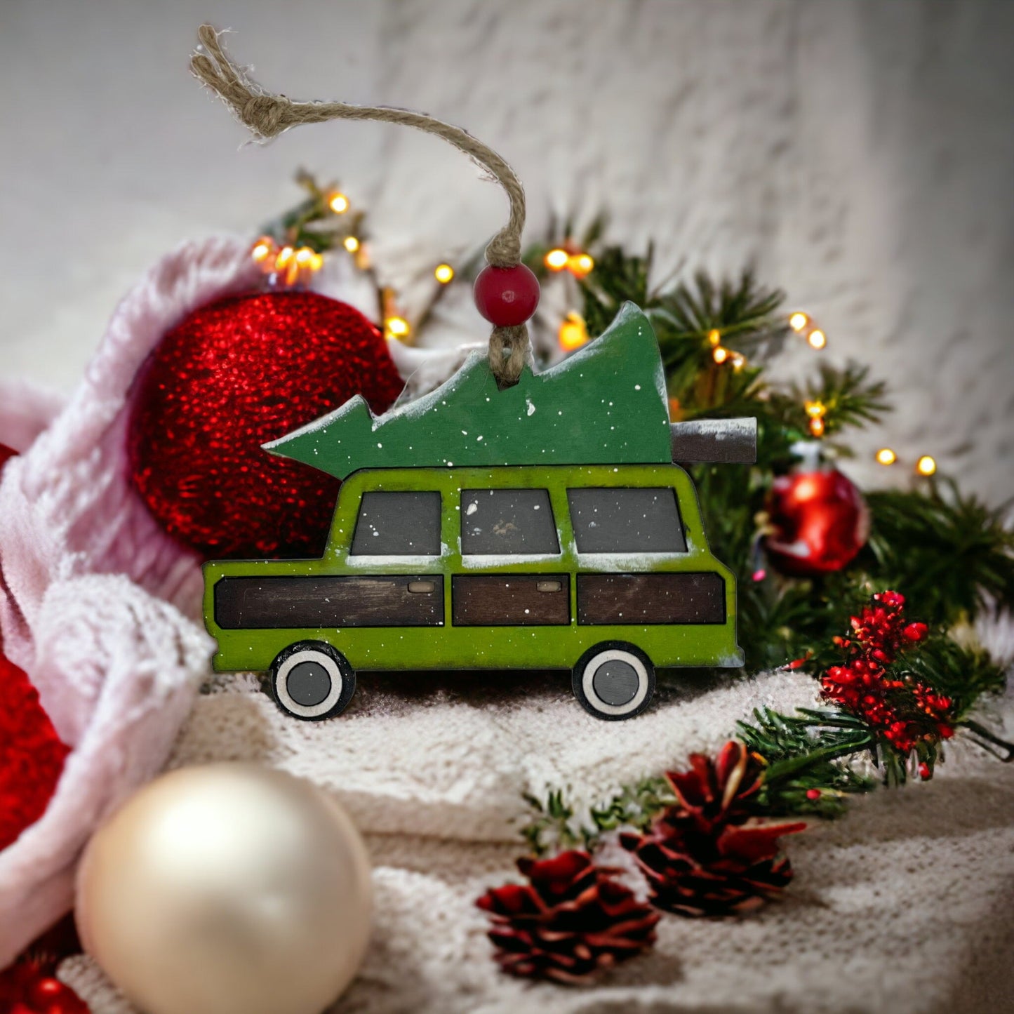 Handcrafted Family Christmas Truck Ornament with vibrant colors and festive design.