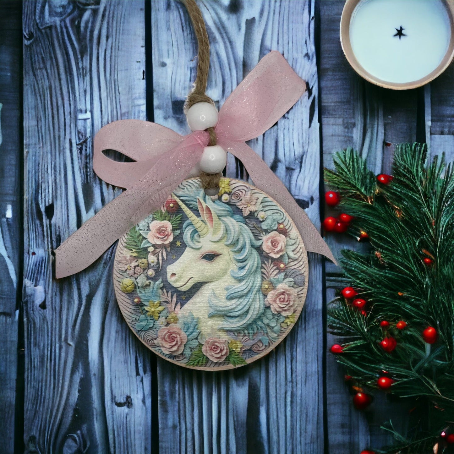 Pink Unicorn Ornament with floral design and pink ribbon.