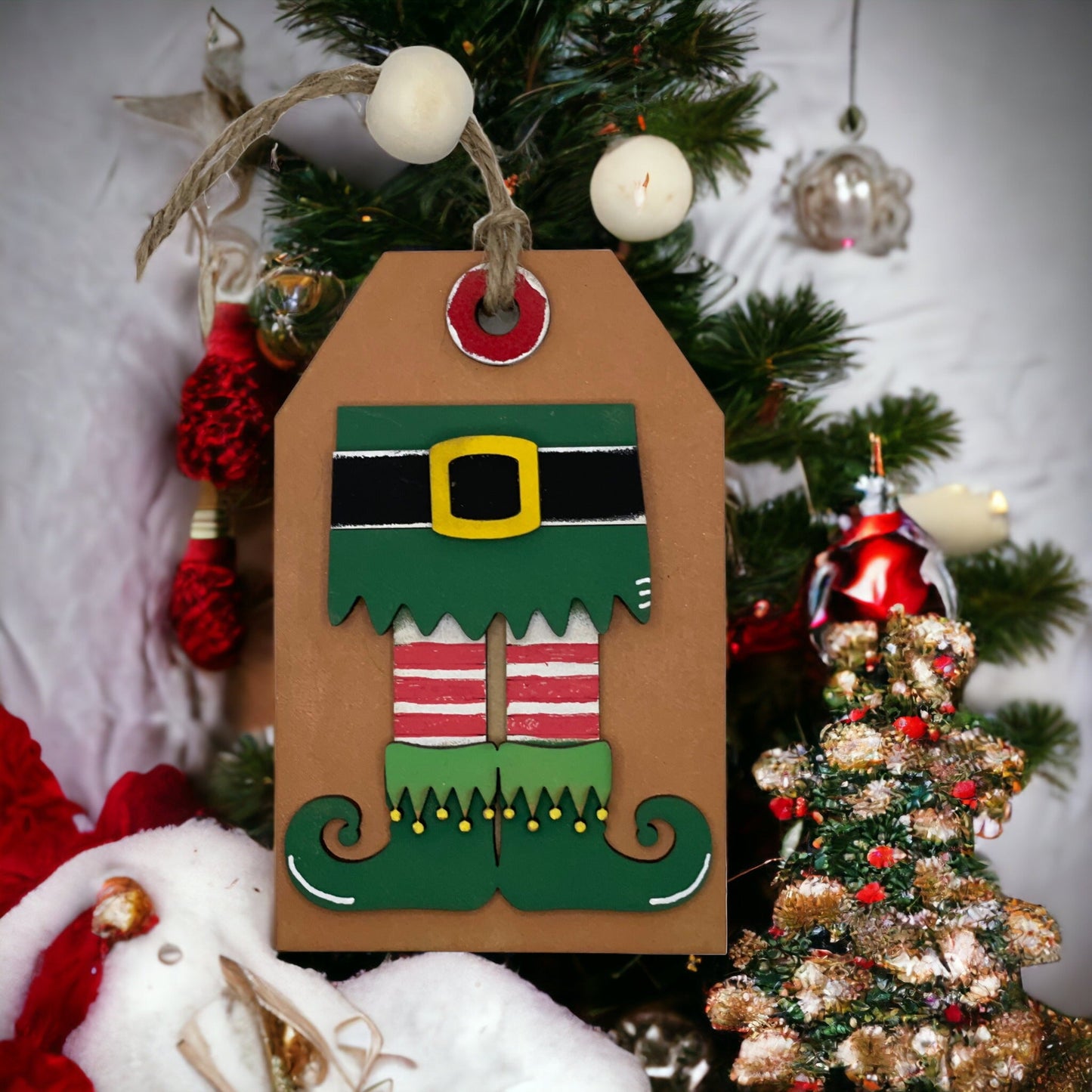Elf Christmas ornament with gift card holder and secret pocket, hand-sculpted and painted, 3x5 inches.