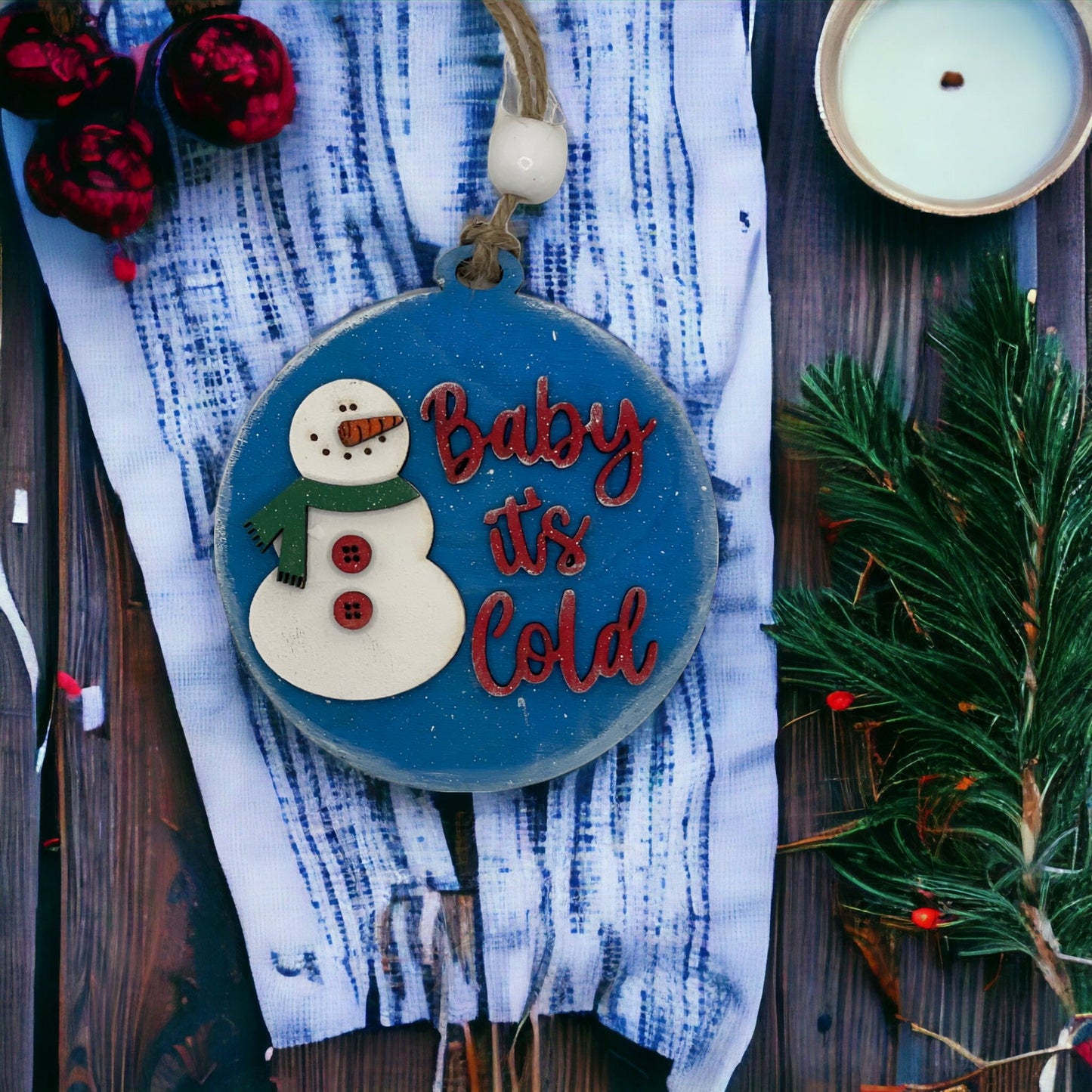 Christmas ornament "Baby It's Cold" with snowman design, handcrafted from quality wood.