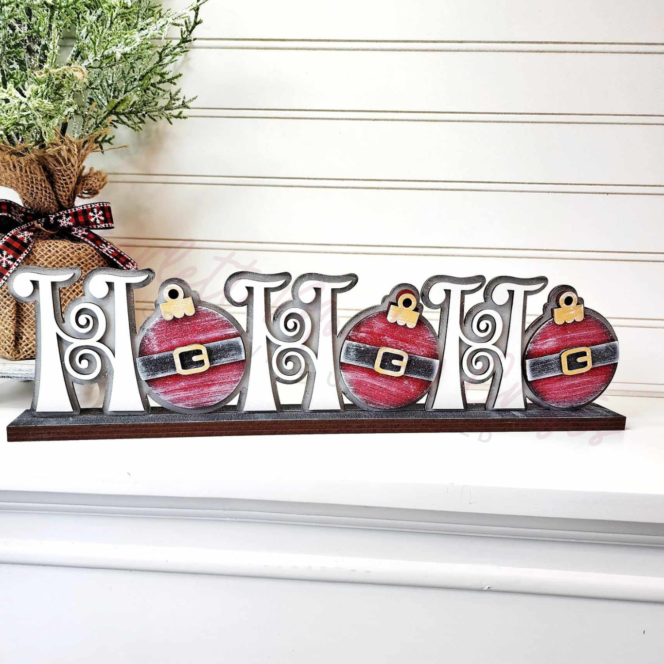 Paintable wood project featuring a standing "Ho Ho Ho" sign with Santa-themed decorations.