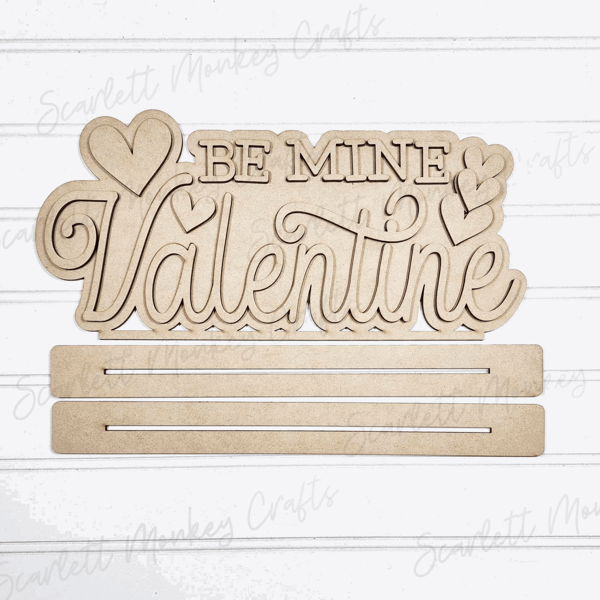 Paintable wood project, Be Mine Valentine Shelf Sitter kit with cutout lettering and heart designs.