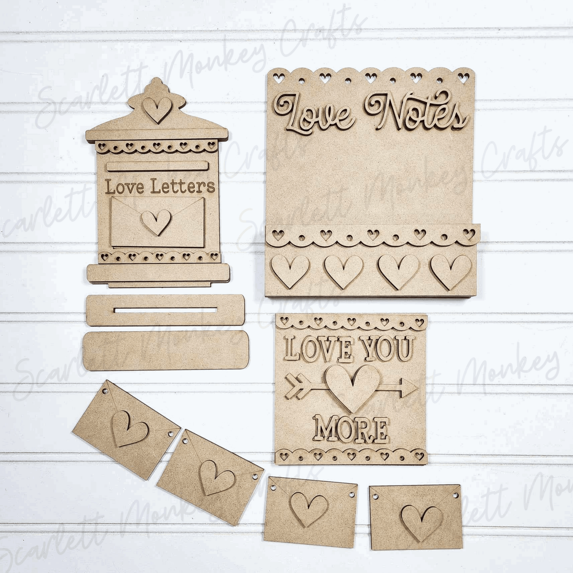Valentine's Day tiered tray set, paintable wood project with heart and love-themed designs.