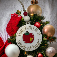 Christmas Ornament - Teaching Is a Work of Heart, handcrafted wood, vibrant design, perfect gift for teachers.